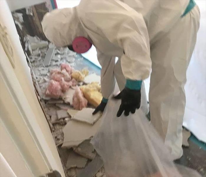 Team member working in PPE.
