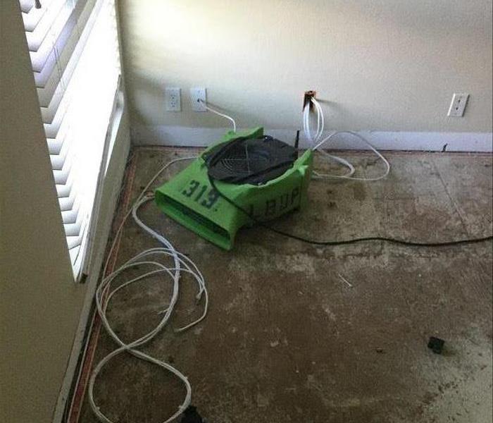 Drying equipment on floor.