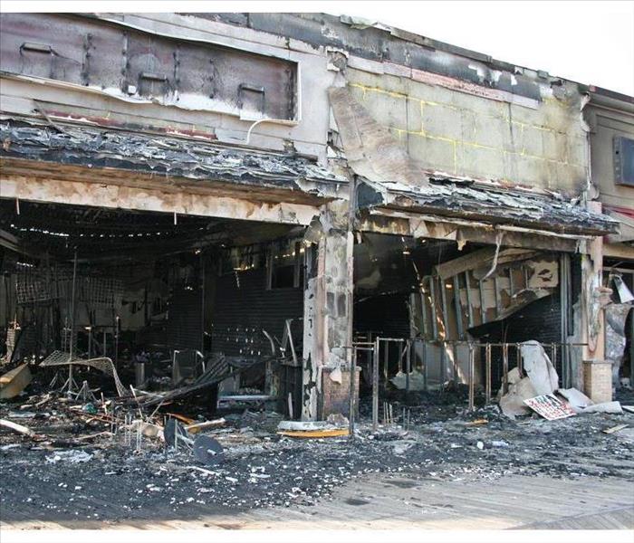 A fire destroyed five stores in a commercial building
